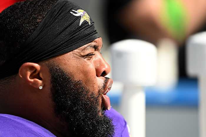 Oct 1, 2023; Charlotte, North Carolina, USA; Minnesota Vikings defensive end Jonathan Bullard (90) on the sidelines in the third quarter at Bank of America Stadium.